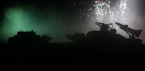 Fototapeta na wymiar Sea battle scene. Silhouette of military war ship on dark foggy toned sky background. Explosion and fire. Dramatic scene decoration.