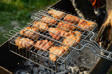 juicy pieces of meat are fried in barbecue
