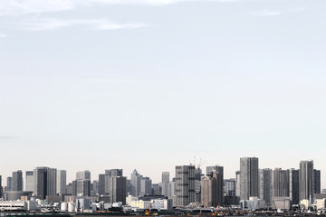 Obraz premium A scenery of a high-rise apartment that stands on the waterfront in Tokyo