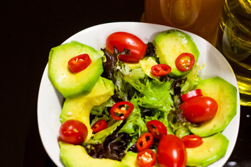 Colourful, Healthy Foods: Avocado, Olive Oil, Vinegar & Fresh Salad Ingredients