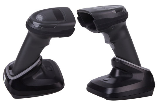 Cordless barcode scanning gun/wand in a USB charging cradle isolated on white. Bluetooth Barcode and QR Code Scanner. Barcode reader