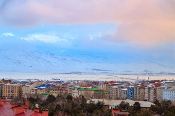 Erzurum cityscape to south part with snowy mountains in sunrise