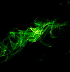 Green smoke on black background