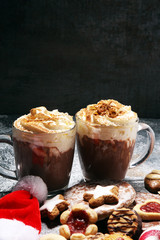 Hot chocolate cocoa with whipped cream for xmas on table