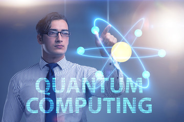 Businessman pressing virtual button in quantum computing concept