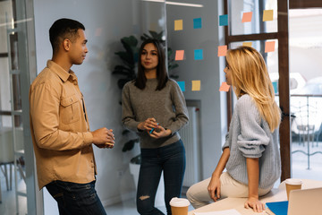 Group of happy multiracial business people working project, planning strategy, talking, discussion...