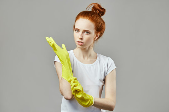 I am ready to clean your house. awesome serious girl tyding up the flat. close up photo. weekend. cleaning girl. scrubwoman