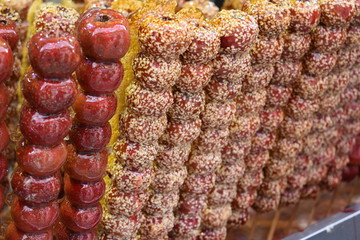 Candied fruits on a skewer at a local Chinese market in Beijing