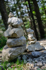 Stone figures on hiking path