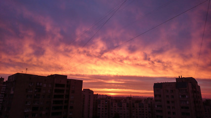  dawn sunset over city sky sun