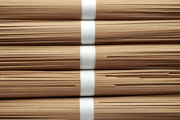 Noodles soba, buckwheat on black background. Traditional Japanese food.