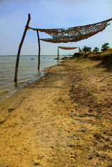 yellow sand on the seashore and blue sky