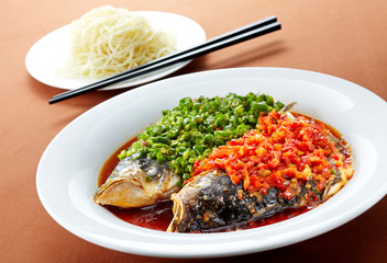 Delicious Chinese Sichuan cuisine, double-colored pepper steamed fish head