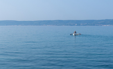 Obraz premium Sea. Sky. Blue. Summer. Row. Boat