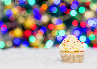 Cupcake on festive background. Empty space for text