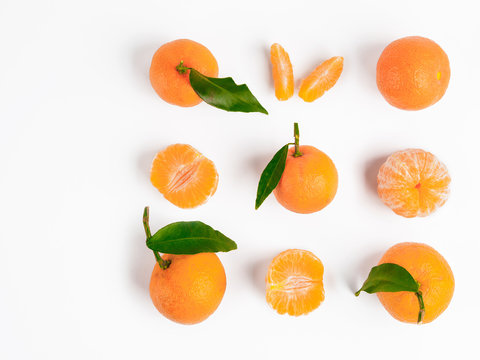 Christmas mandarin or tangerines seamless pattern. Isolated on white with clipping path. Top view or flat-lay. Copy space.