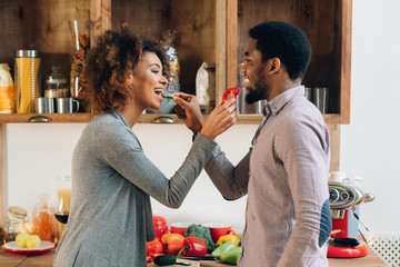 Couple in love in kitchen concept