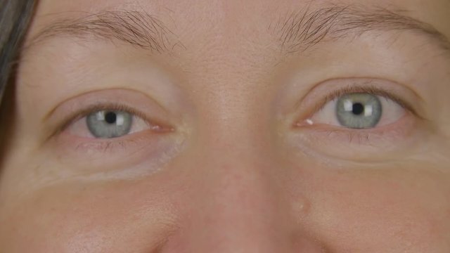 Close up blue woman eyes. Eyes close up. Beauty woman face. Human eye macro. Beauty cosmetics. Human eye iris close up. Eye skin care. Close look.