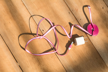 Cable connector USB-B or USB-C on wooden background, Connector with wire, Concept of connection, Design is heart shapes for valentine days, Love concepts