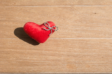 One hearts on wooden texture background. Valentines day card concept. Heart for Valentines Day Background