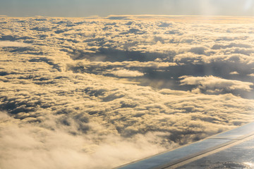View on white clouds from the airplane window
