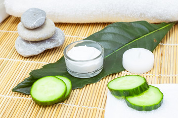 Natural Skin Care Products. View ingredients on table concept of the best all natural face moisturizer. Spa stone and white towel	