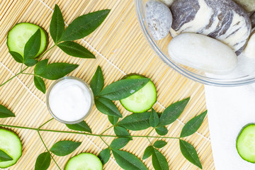 Natural Skin Care Products. Top view ingredients on table concept of the best all natural face moisturizer. Spa stone and white towel	