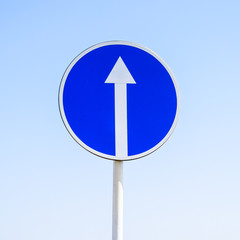 Traffic sign straight ahead. prescriptive sign. Sign on a blue s