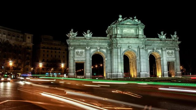 Beautiful Time lapse 4K of Puerta de Alcala in Madrid city Spain at night