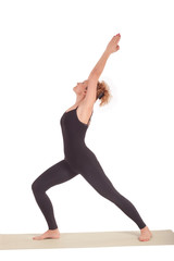 Beautiful Yoga: Senior Woman doing Virabhadrasana Warrior one pose