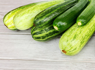Zucchini. Fresh zucchini or courgette on wooden.