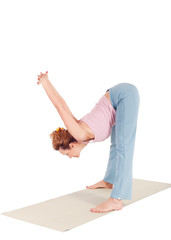 Beautiful Yoga: Senior Woman doing Prasarita Padottanasana Wide Legged Forward Bend Pose