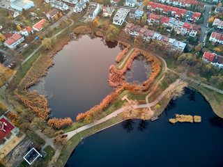 Beautiful panoramic aerial drone view to Cietrzewia ponds or Glinianki Cietrzewia - two water reservoirs, located in Warsaw, in the Włochy district - obrazy, fototapety, plakaty