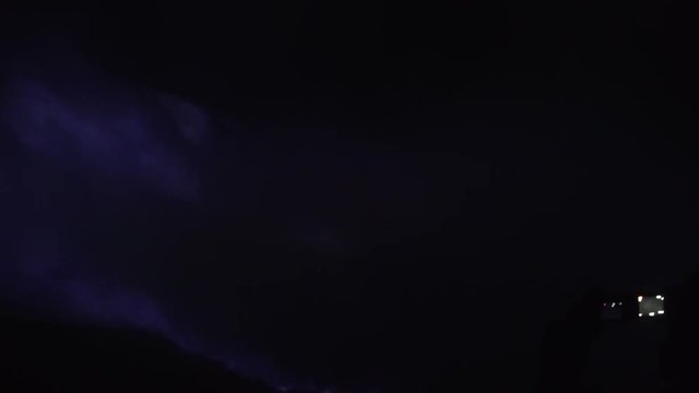 Blue fire of burning sulfur in a crater of a volcano Kawah ijen, Java, Indonesia. Famous tourist attraction, where sulfur is mined. Ijen volcano complex is a group of stratovolcanoes in the Banyuwangi