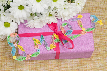 Gift and flowers for the day of March 8