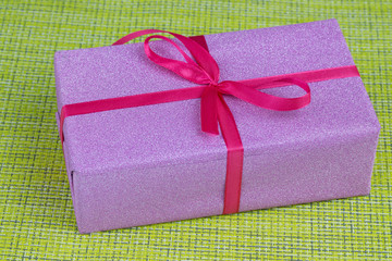 Gift on a green background.
