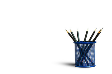 group black wooden pencils set in metal basket on white background.