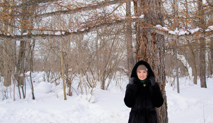girl in the woods in winter