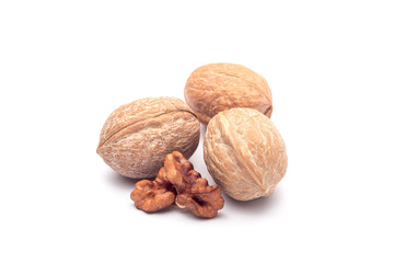 Group of walnuts in a shell isolated on white background