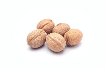 Group of walnuts in a shell isolated on a white background