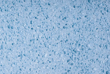 Fototapeta na wymiar Blue sponge abstract textured background