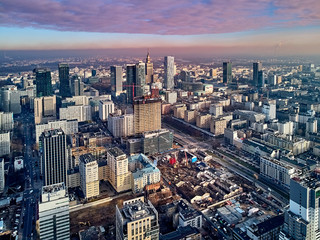 WARSAW, POLAND - NOVEMBER 27, 2018: Beautiful panoramic aerial drone view to the center of Warsaw City and The Warsaw Spire - 220 metre neomodern office building on European square (Plac Europejski)