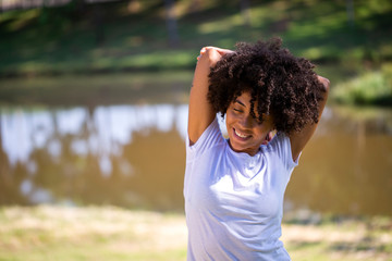African brazilian woman jogger stretching - Fitness, people and healthy lifestyle - Imagem