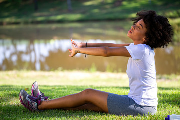 African brazilian woman jogger stretching - Fitness, people and healthy lifestyle - Imagem