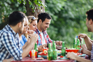 Young people in nature having fun and smiling
