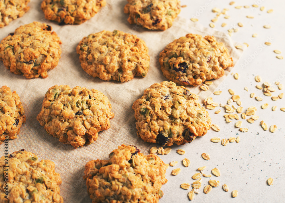 Wall mural Homemade oat cookies on white background