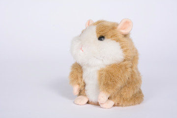 Hamster soft toy on a white background