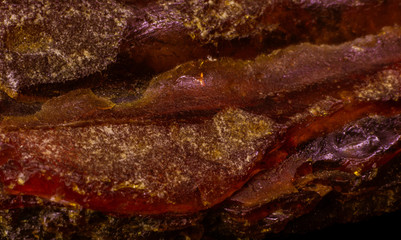 The texture of a natural piece of amber macro
