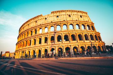 Fototapeta na wymiar The ancient Colosseum in Rome at sunset