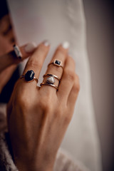 Hands with bohemian rings